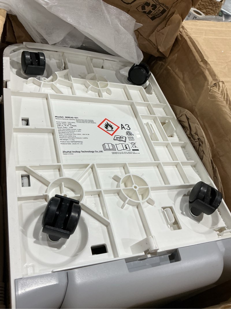 Condition photo showing As Is for aeocky 50 pint/day compressor dehumidifier, 3500sq.ft for basement, home, bedroom, bathroom, with drain hose, 0.8 gallon water tank capacity, intelligent humidistat, quiet ivory