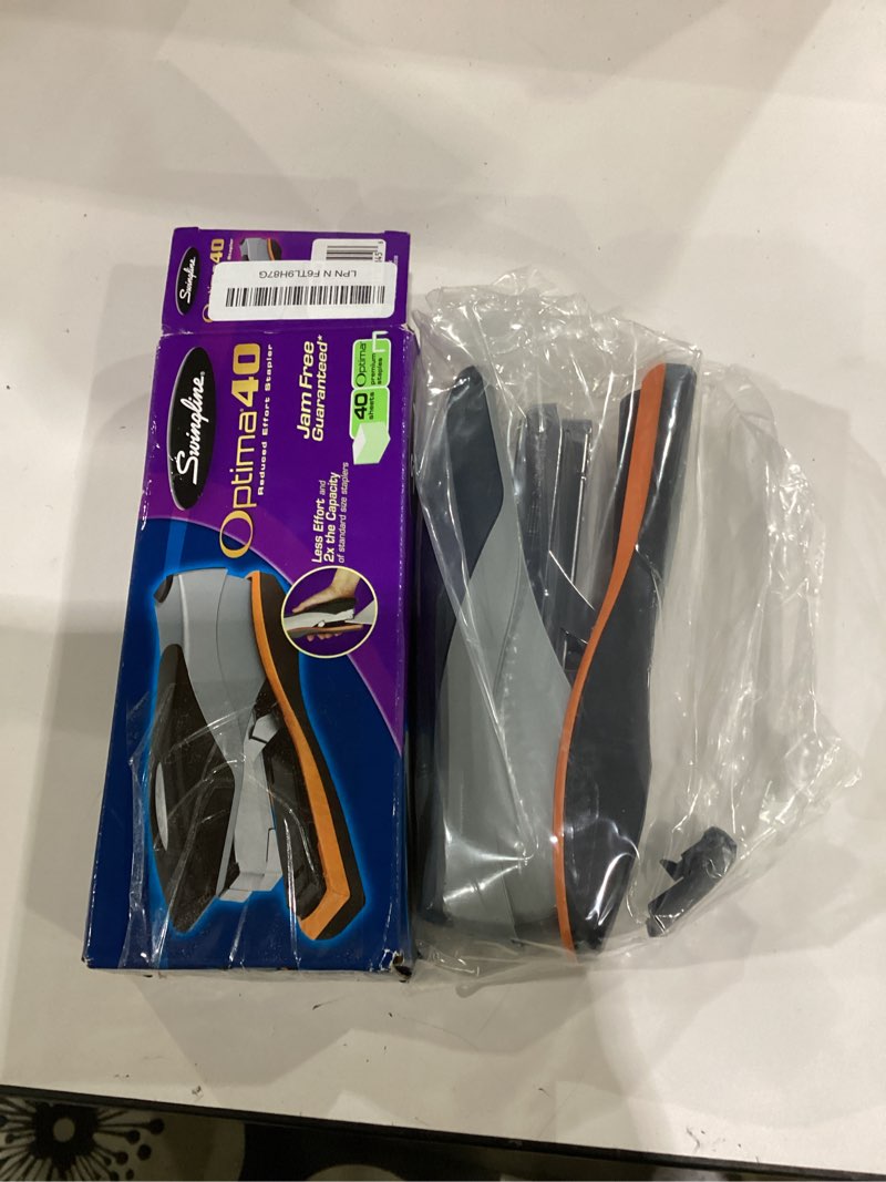 Condition photo showing New/Like New for swingline stapler, 40 sheet capacity, optima 40, jam free, reduced effort, soft grip, metal, orange and gray (87845) pack of 1