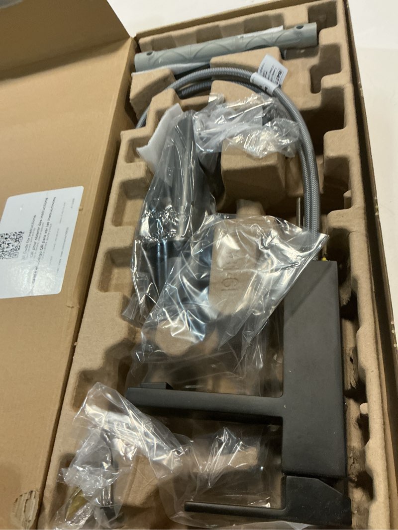 Condition photo showing item condition for Moen Revyl Matte Black One-Handle Single Hole Modern Bathroom Sink Faucet with Optional Deckplate and Spring Loaded Drain Assembly, 84771BL