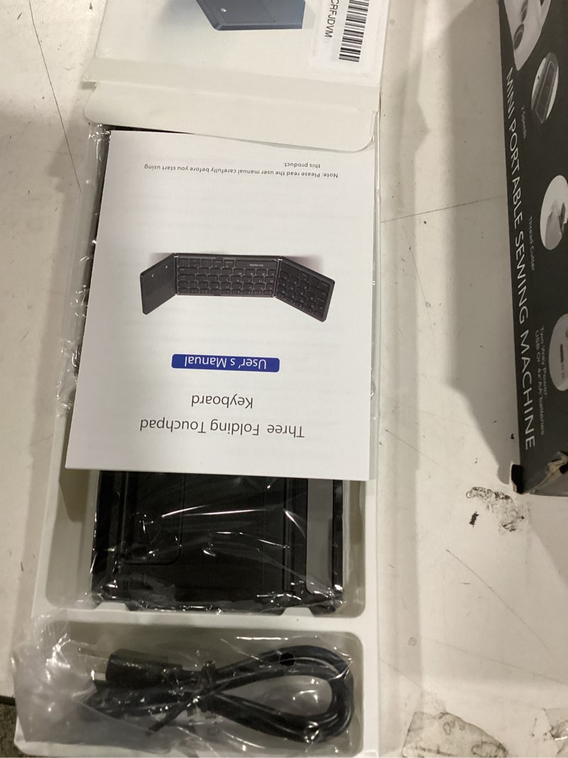 Condition photo showing Good Condition for Samsers Foldable Bluetooth Keyboard with Touchpad - Portable Wireless Keyboard with Holder, Rechargeable Full Size Ultra Slim Pocket Folding Keyboards for Android Windows iOS Tablet & Laptop - Black BT x1 Black