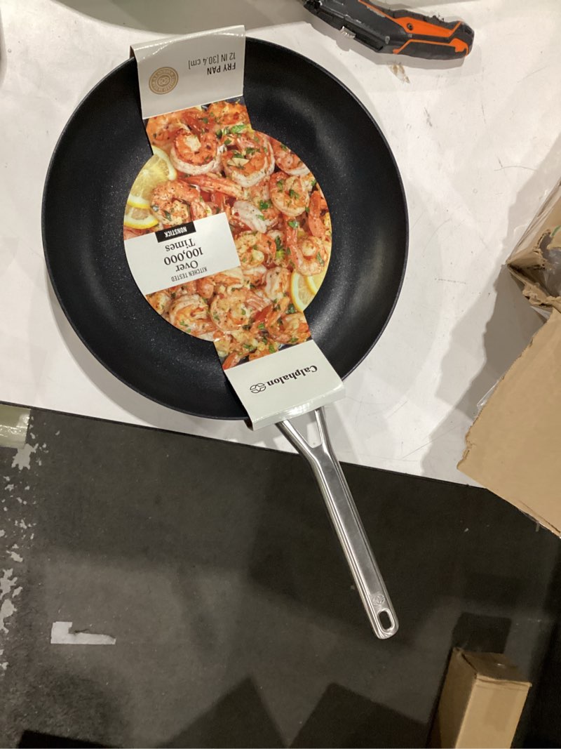 Condition photo showing New/Like New for calphalon® hard-anodized nonstick 12-inch frying pan