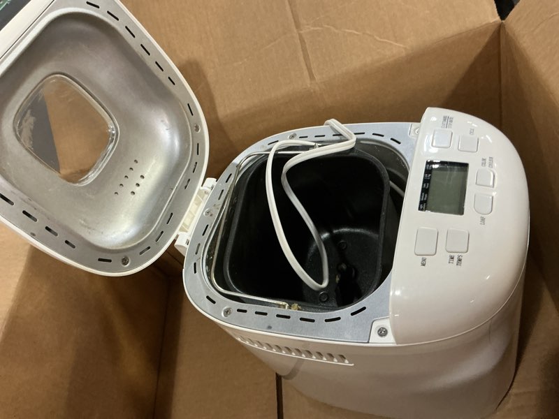 Condition photo showing As Is for Amazon Basics Programmable Bread Maker, 2 Pound Non-Stick Automatic Bread Making Machine, 14 Settings for Breads, Doughs, Gluten-Free Options and More, LCD Display, White