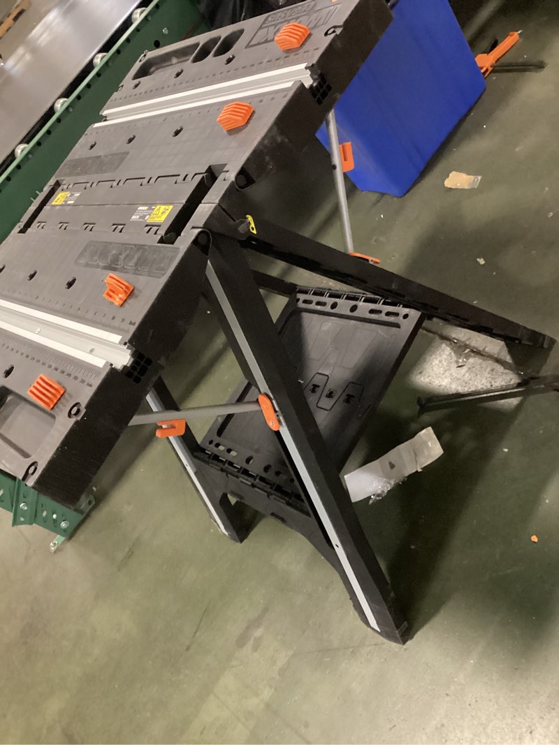 Condition photo showing As Is for Worx WX064 Pegasus Folding Work Table & Sawhorse
