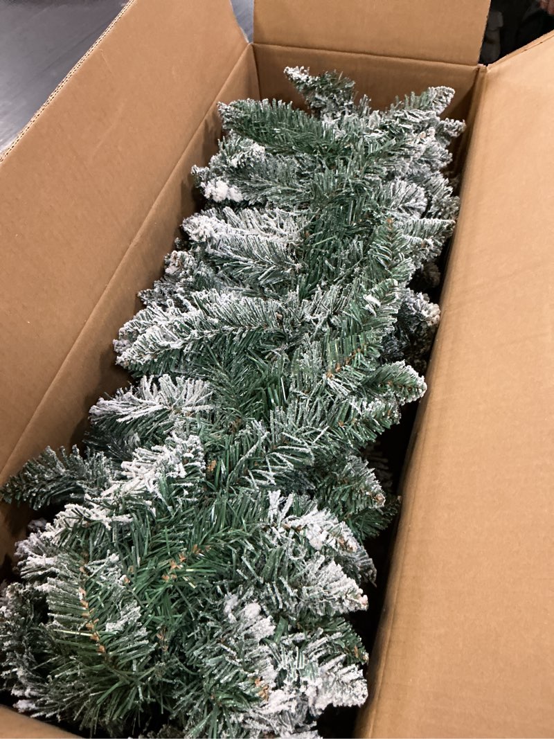 Condition photo showing New/Like New for 9ft. flocked artificial christmas garland with 50 warm white led lights,green