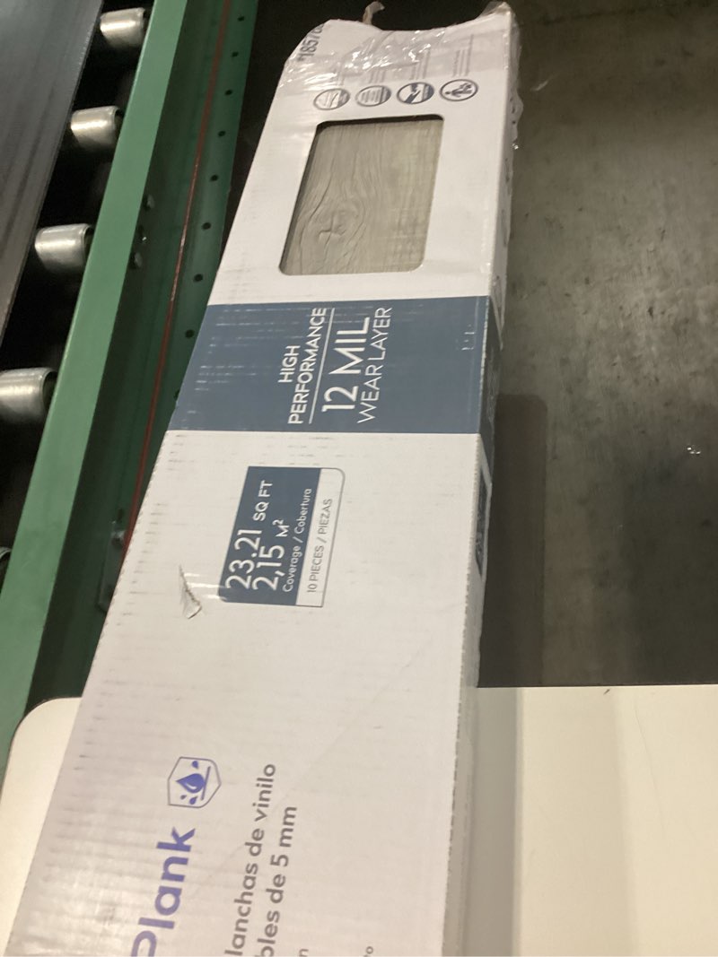 Condition photo showing As Is for procore plus charleston oak 7-in x 47.75-in waterproof interlocking luxury vinyl plank flooring (23.21-sq ft)