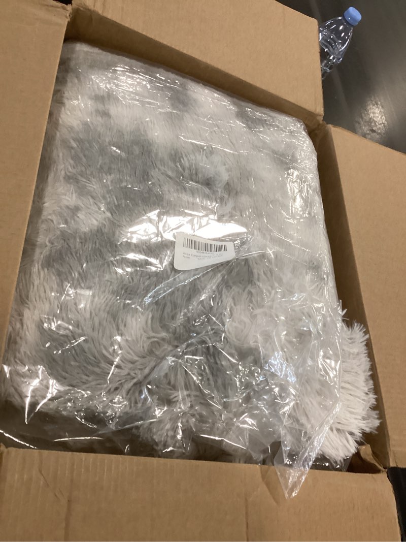 Condition photo showing Good Condition for Large Shag Area Rugs 6 x 9, Tie-Dyed Plush Fuzzy Rug for Living Room, Ultra Soft Fluffy Furry Rugs for Bedroom, Indoor Carpet Nursery Rugs for Kids Room Home Decor, Light Grey Tie-dyed Light Grey 6 x 9 ft