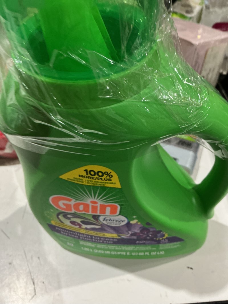 Condition photo showing Good Condition for gain, laundry detergent moonlight breeze + aroma boost, 65 fl oz