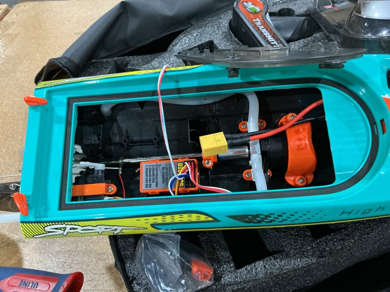 Condition photo showing As Is for topchoic brushless rc boat 40+mph, remote control boats for adults kids, 19" big racing boat for salt water lake river with self-righting, led lights, fishing function fast high speed with carry bag green