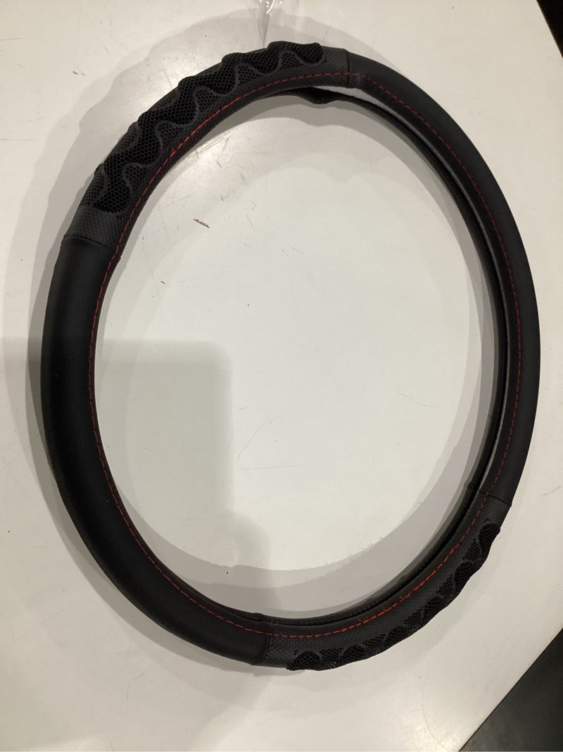 Condition photo showing Good Condition for 15 inch universal carbon fiber style steering wheel cover, anti-slip rubber grip with raised particles, comfortable feel, for car steering wheel protection (carbon red)