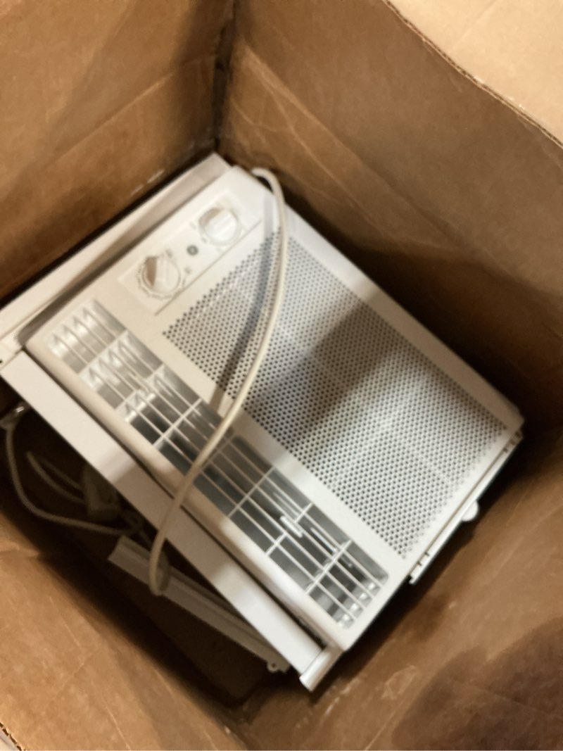 Condition photo showing As Is for ge window air conditioner unit, 5,000 btu for small rooms up to 150 sq ft. with manual adjustable fan and cooling settings, perfect for small bedroom or living room, easy install kit included, white new 5,000 btu mechanical controls white