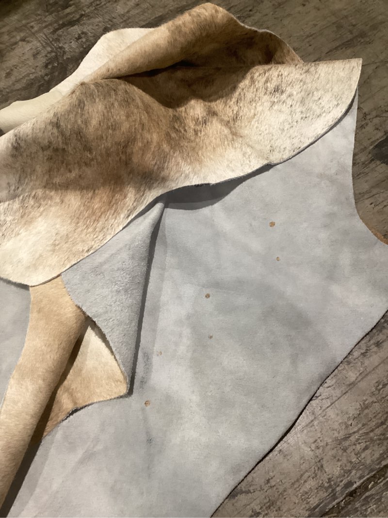 Condition photo showing As Is for tom tom cowhide brindle medium cowhide rug 100% natural leather rugs 7' x '6