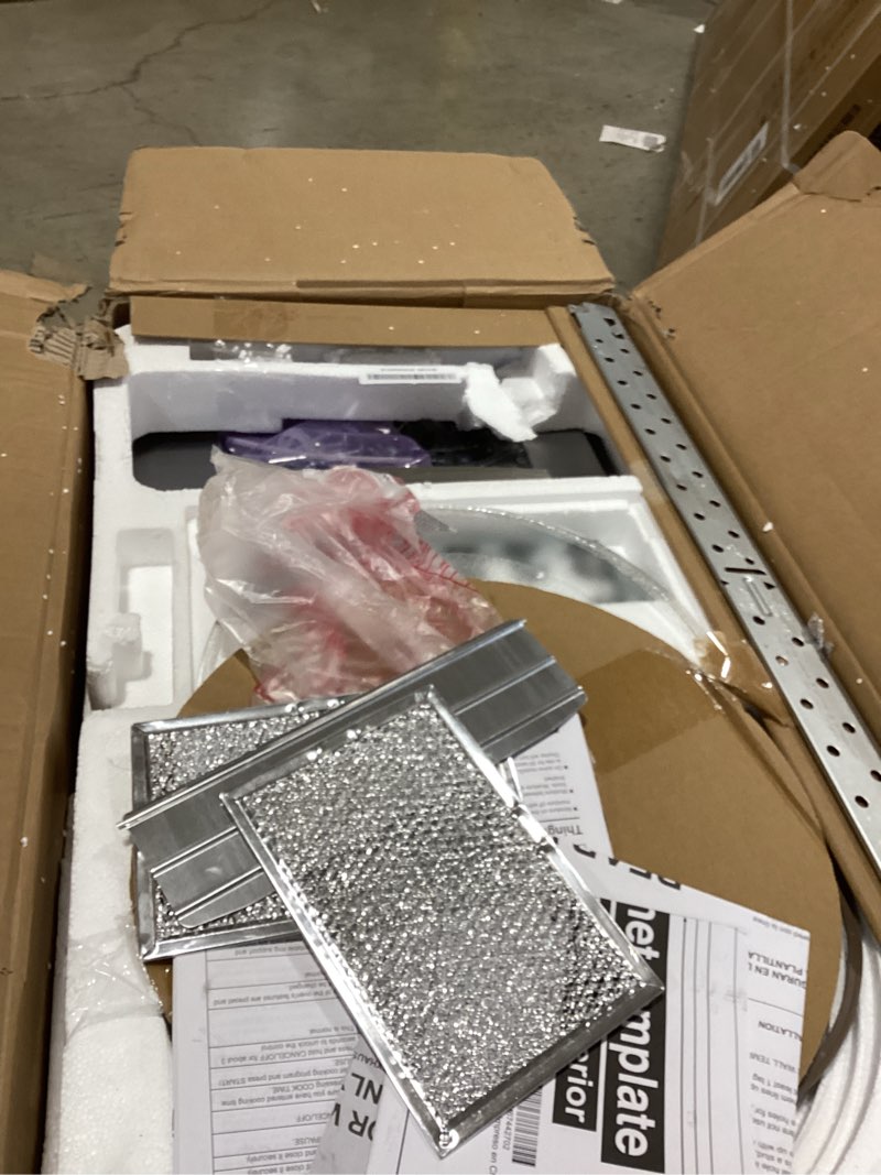 Condition photo showing As Is for ge jvm3160rfss 30" otr microwave, 1.6 cu ft, 1000w, 300 cfm hood vent, led lighting, auto defrost, easy mount install, stainless steel