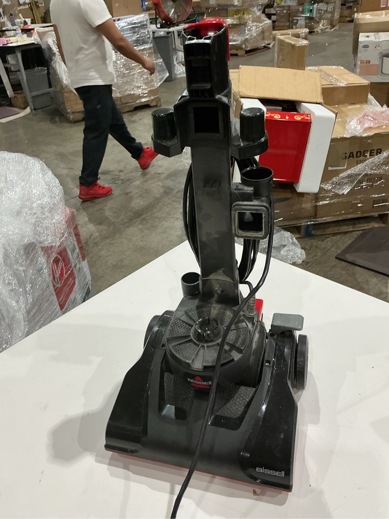 Condition photo showing As Is for bissell cleanview compact bagless upright vacuum cleaner