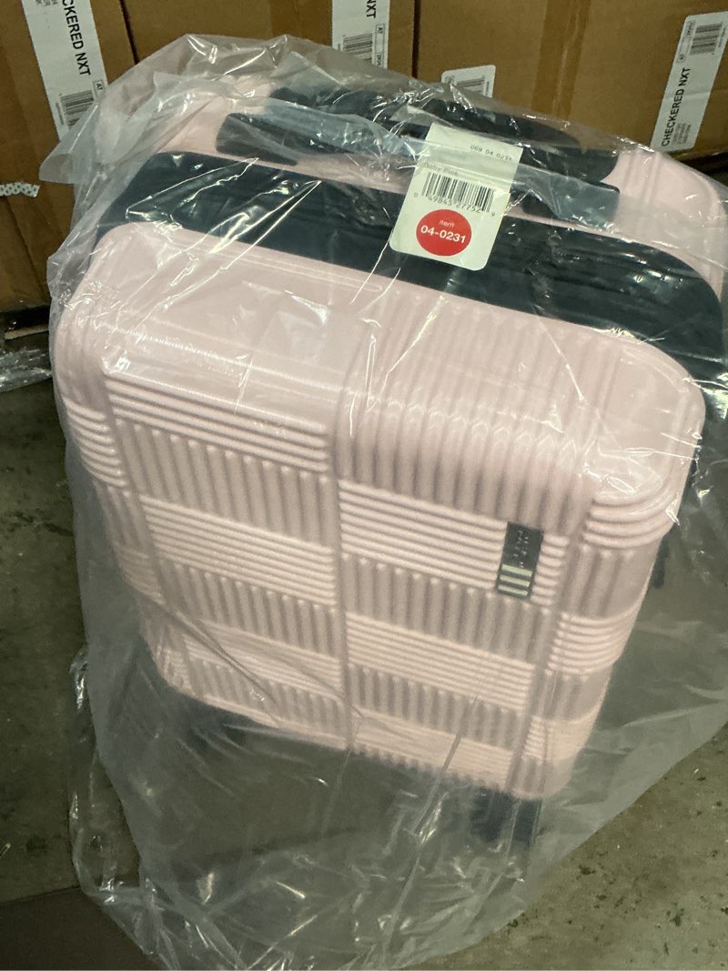 Condition photo showing New/Like New for american tourister nxt checkered hardside carry on spinner suitcase - pink
