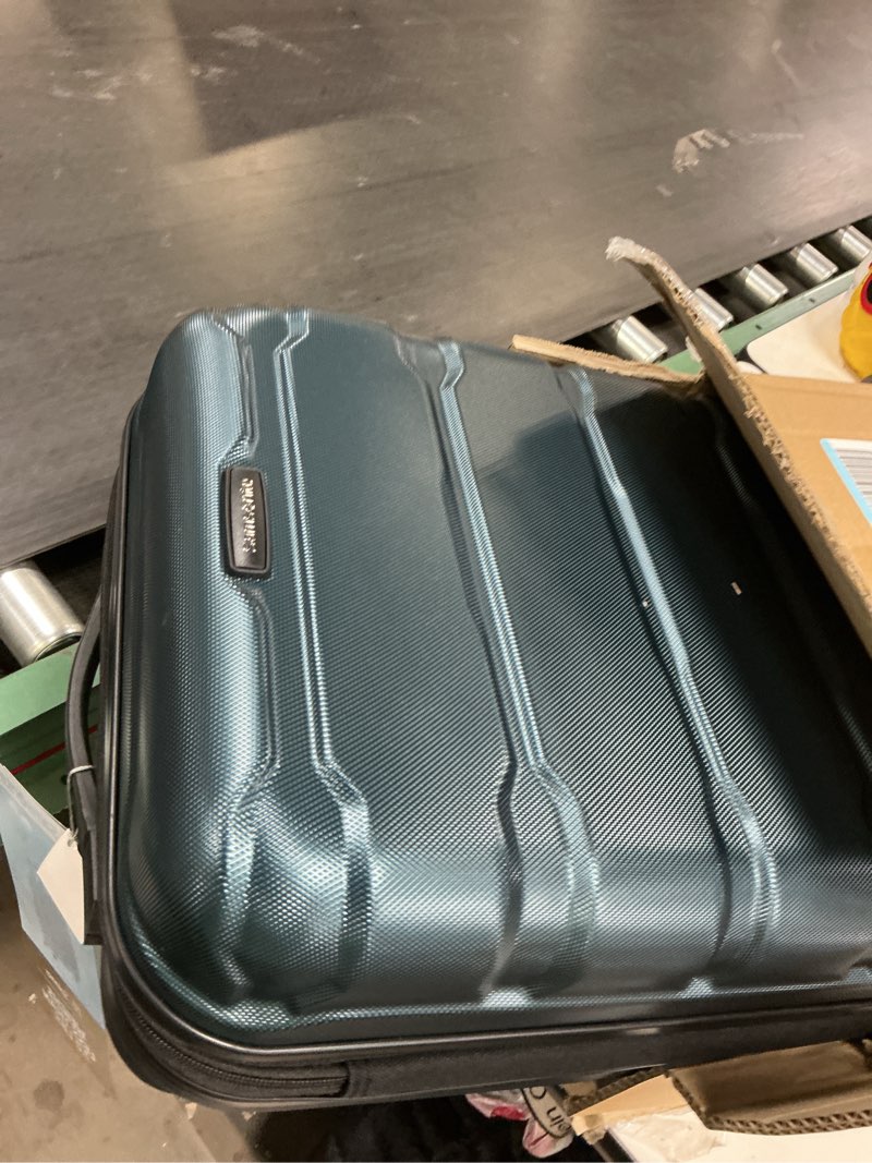 Condition photo showing Good Condition for Samsonite Omni PC Hardside Expandable Luggage with Spinner Wheels, Teal, Carry-On 20-Inch Carry-On 20-Inch Teal