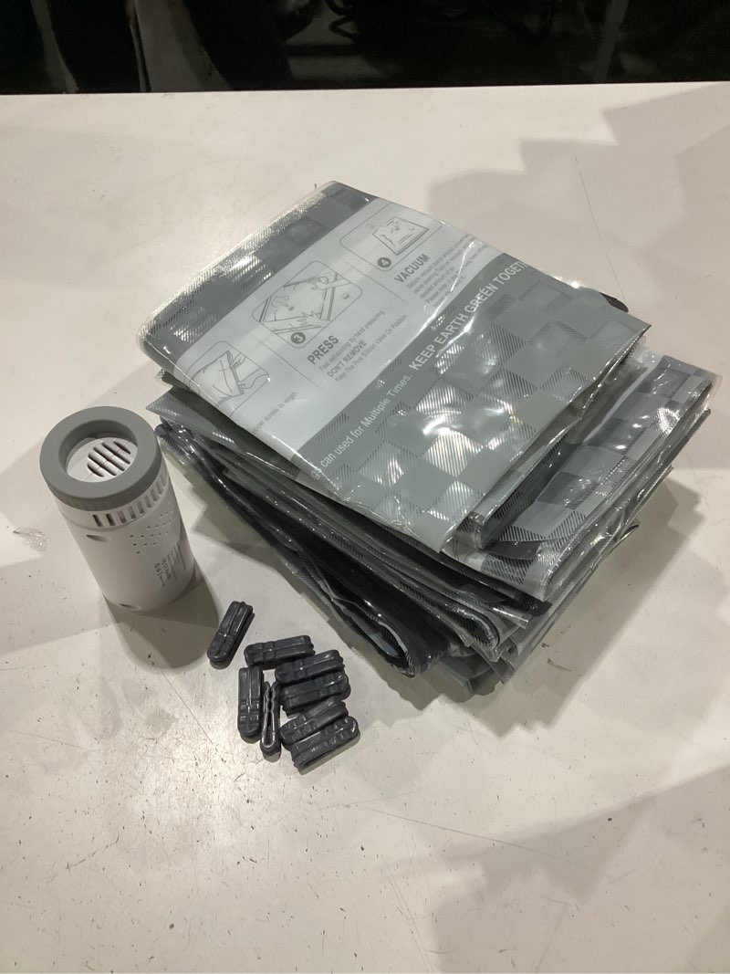 Condition photo showing New/Like New for vacuum bags for travel with rechargeable digital display air pump,12 pcs combo travel size vacuum seal bags for luggage and suitcase,space saver for clothes,home storage 12 combo travel size