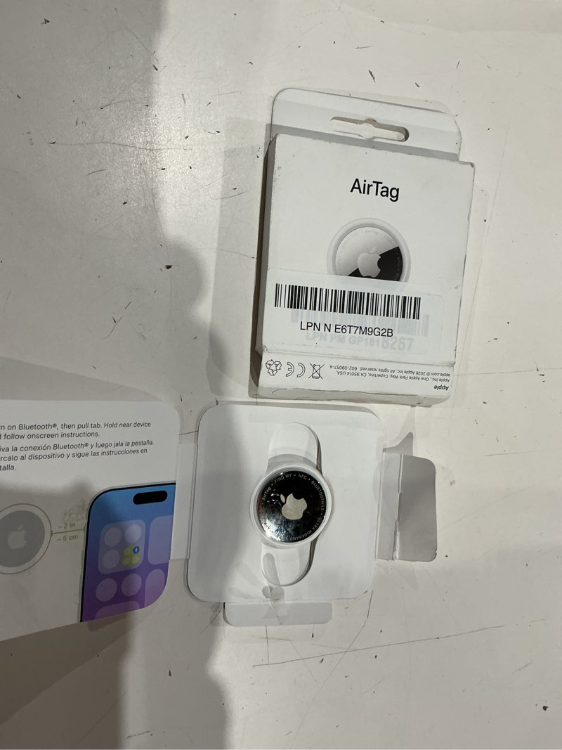 Condition photo showing As Is for apple airtag (2nd generation): tracker for keychain, wallet, and more; locator with sound; simple one-tap setup with iphone or ipad; key finder with up to 1.5x precision finding range 1 pack