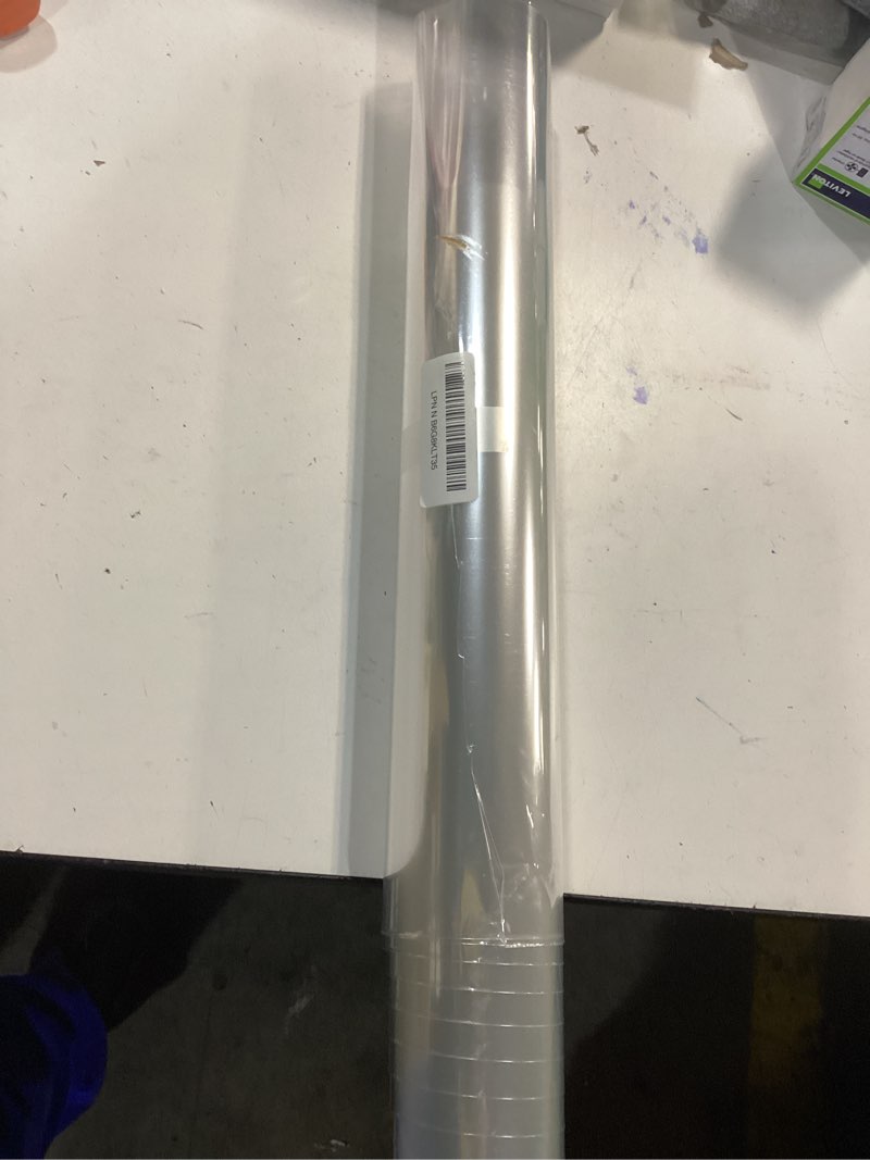 Condition photo showing As Is for JOYIT 100 ft Clear Cellophane Wrap Roll (31.5 in x 100 ft) - 3 Mil Thicken Cellophane Roll,Cellophane Bags Large,Wrapping Paper for Flower Gift Baskets Wrap (31.5" fold into 16") Clear 31.5in Wide x 100ft Long