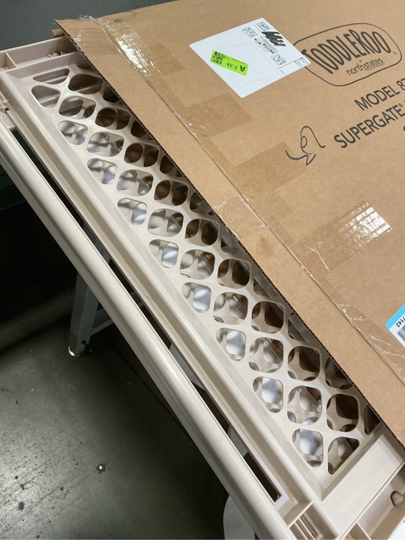 Condition photo showing Good Condition for Toddleroo by North States 42” Wide Supergate Ergo Baby Gate, Made in USA: For Doorways or stairways. Includes Wall Cups. Pressure or Hardware Mount. 26” - 42” Wide (26" Tall, Sand) (B01HG7E5R8)