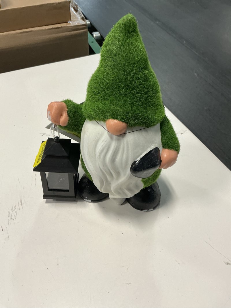 Condition photo showing As Is for mainstays solar mossy gnome garden statue with led lantern