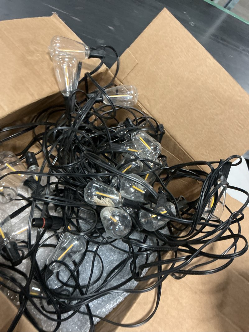 Condition photo showing As Is for brightech ambience pro solar powered outdoor string lights -27 ft commercial grade waterproof edison patio lights, shatterproof led string lights for outside, porch - 30 bulbs, 1w soft white bright 30 feet ( 30 light )