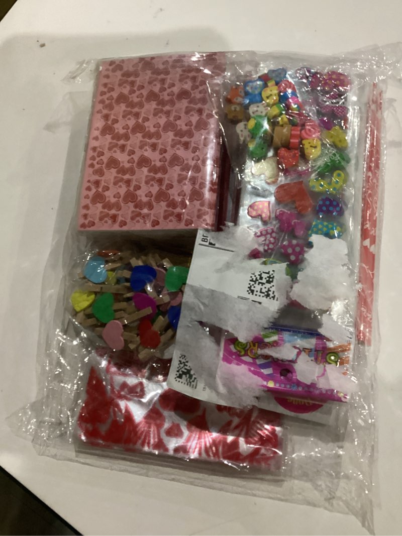 Condition photo showing Good Condition for Valentines Gifts for Kids - 28 Pack Assorted Valentines Stationery set Valentines Cards Valentines Pencils Erasers Notepads, Valentine Treat Bags Goodie Bags Fillers Valentines favor for kids