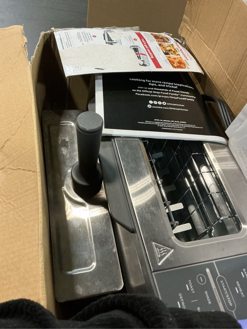 Condition photo showing As Is for Ninja ST101 Foodi 2-in-1 Flip Toaster, 2-Slice Capacity, Compact Toaster Oven, Snack Maker, Reheat, Defrost, 1500 Watts, Stainless Steel, 6 Functions