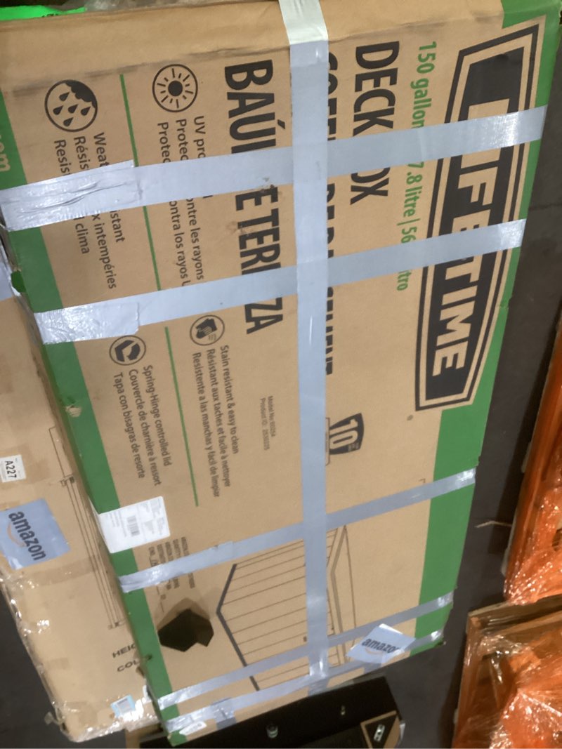 Condition photo showing As Is for LIFETIME 60254 Heavy-Duty Outdoor Storage Deck Box, 150 Gallon, Desert Sand/Brown Desert Sand/Brown 150 Gallon