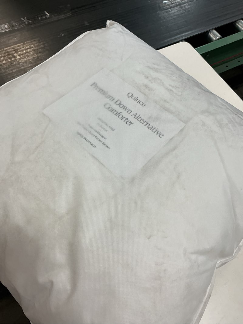 Condition photo showing As Is for premium down alternative comforter