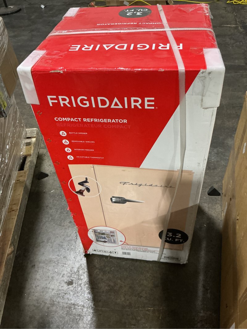 Condition photo showing New/Like New for Frigidaire Retro Compact Fridge with Chiller, 3.2 cu ft Countertop Fridge with Built-In Bottle Opener, Compact Refrigerator for Office, Bedroom, Dorm Room or Cabin - 16.5" D x 19" W x 31" H (Coral) Pink