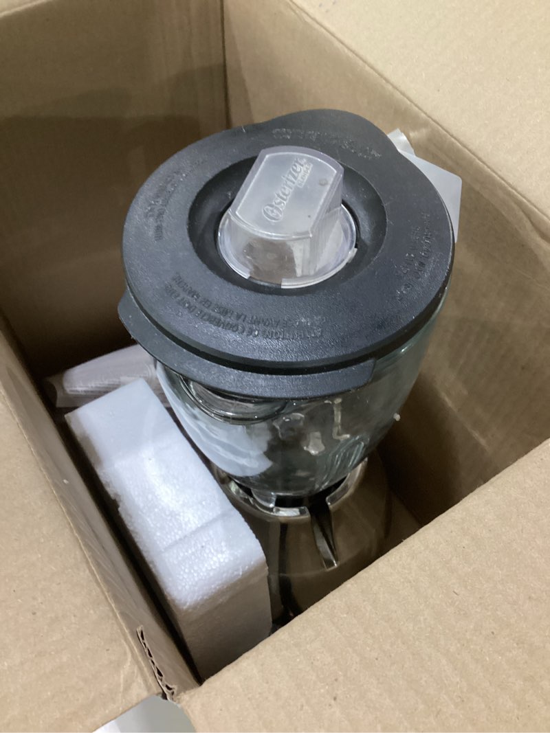 Condition photo showing As Is for Oster Classic Series 16-Speed Blender with Food Chopper & 5-Cup Glass Jar, Countertop Kitchen Blender, Brushed Nickel Black + Glass Jar Countertop Blenders