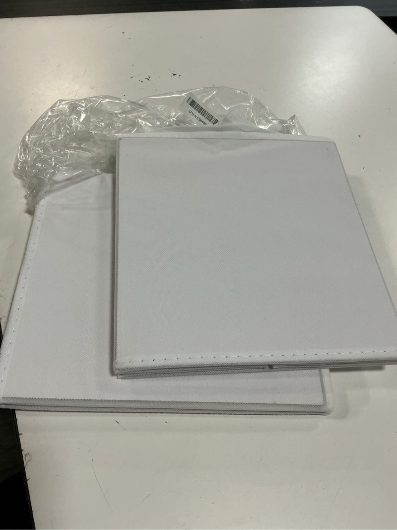 Condition photo showing Good Condition for hoonex storage bins with lids for organizing, pack of 2, storage boxes with 2 carrying handles and sturdy heavy cardboard, 16.5" l x 11.8" w x 7.5" h for shoes, books, clothes, nursery, white