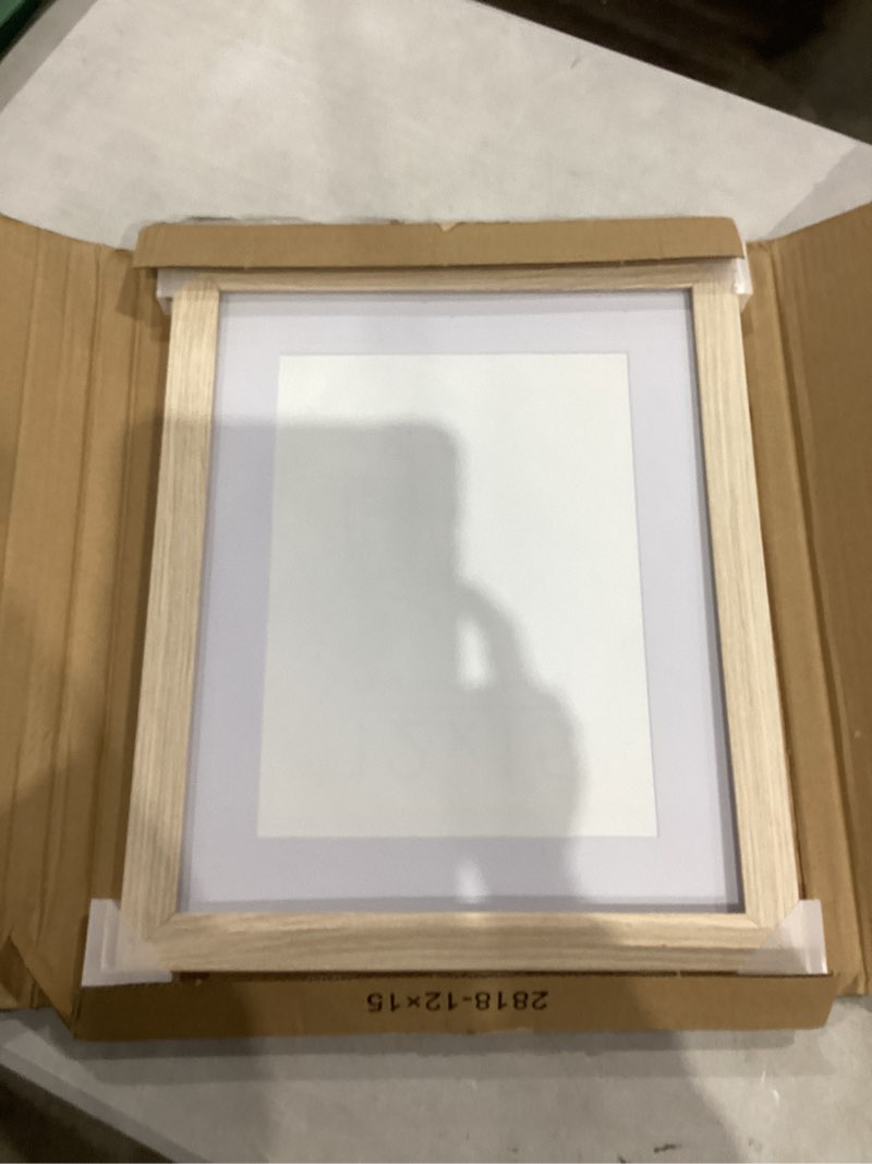Condition photo showing Good Condition for Americanflat 12x15 Picture Frame with Shatter-Resistant Glass - Use as 9x12 Frame with Mat or Display 12x15 Photo Without Mat - Hudson Collection - Wide Picture Frames for Wall Display - Natural Oak Natural Oak 12x15