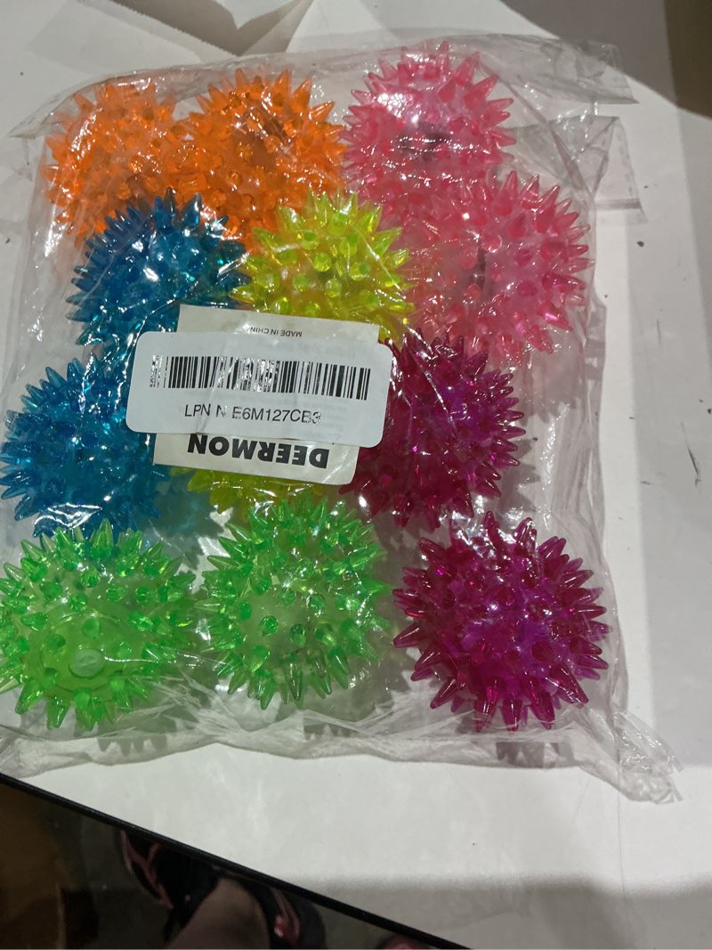 Condition photo showing Good Condition for 12 pack led light up fidget sensory bouncy spiky ball squishy glow in the dark flashing stress relief spiky balls toy for party favors kids gifts school rewards