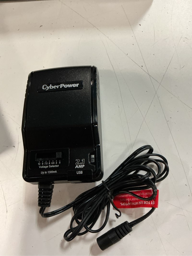 Condition photo showing Good Condition for cyberpower cpuac1u1300 - universal power adapter, 1300ma, usb & round-pin connectors, 7 tips, folding plug