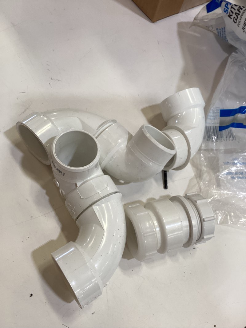 Condition photo showing As Is for dearborn space-saving 1-1/2-in plastic double bowl incomplete