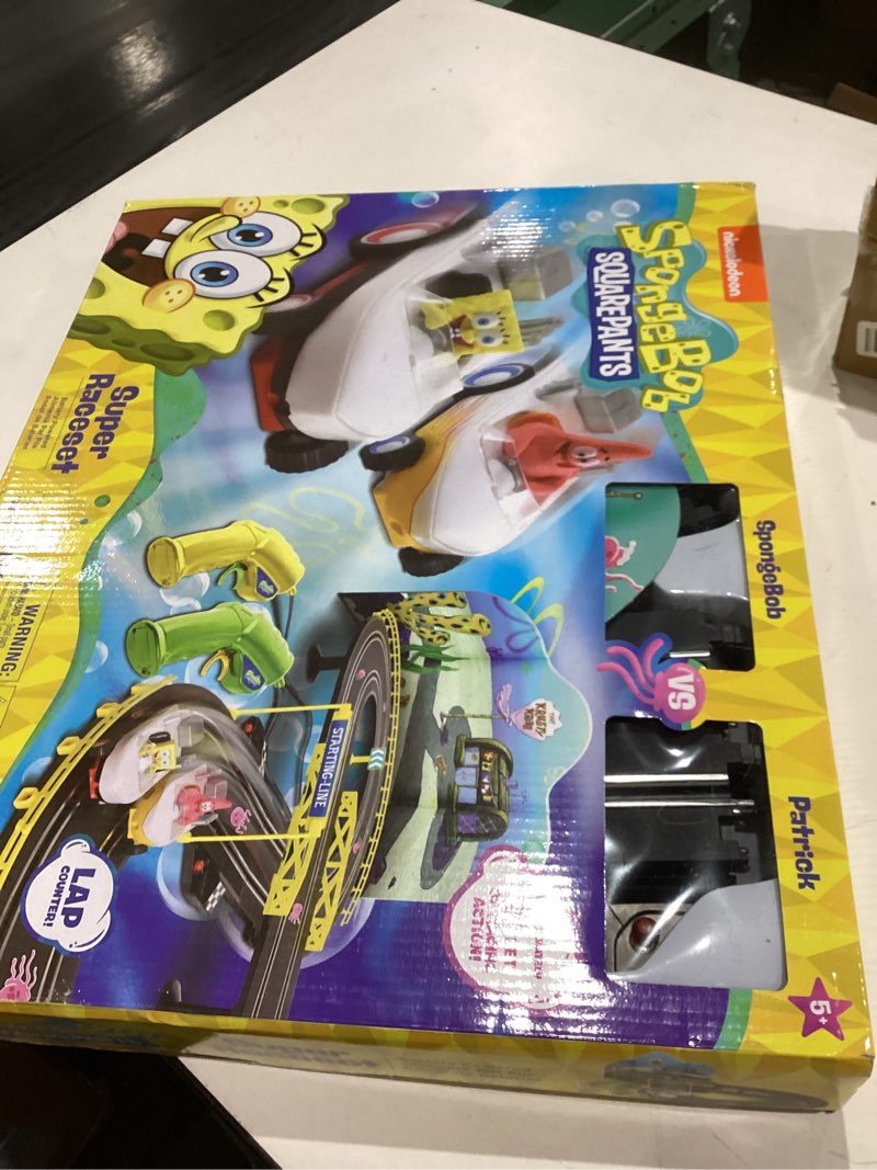 Condition photo showing Good Condition for nkok spongebob hot rod boat slot car race set 2531, contains 8 feet of track, dual players, great item for kids to play with, features a lap counter, ages 6 and up