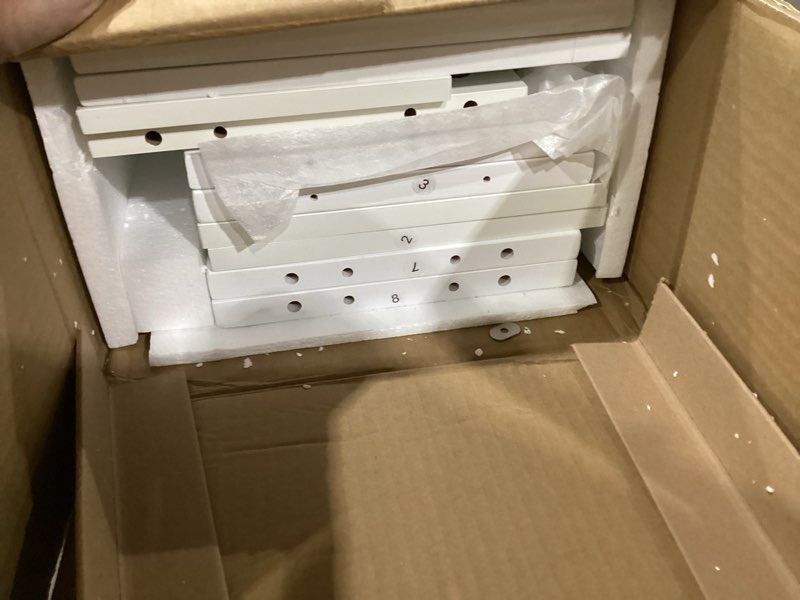 Condition photo showing New/Like New for songmics over the toilet storage cabinet, bathroom cabinet with adjustable inside shelf and bottom stabilizer bar, space-saving toilet rack, cloud white ubts010w01 cloud white cabinet