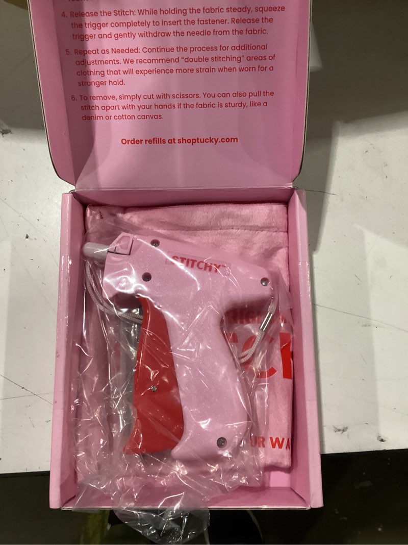 Condition photo showing Good Condition for stitchy no-sew hemming tool- easy, portable, professional-grade tagging gun for quick, temporary hems on pants, skirts, dresses, and sleeves