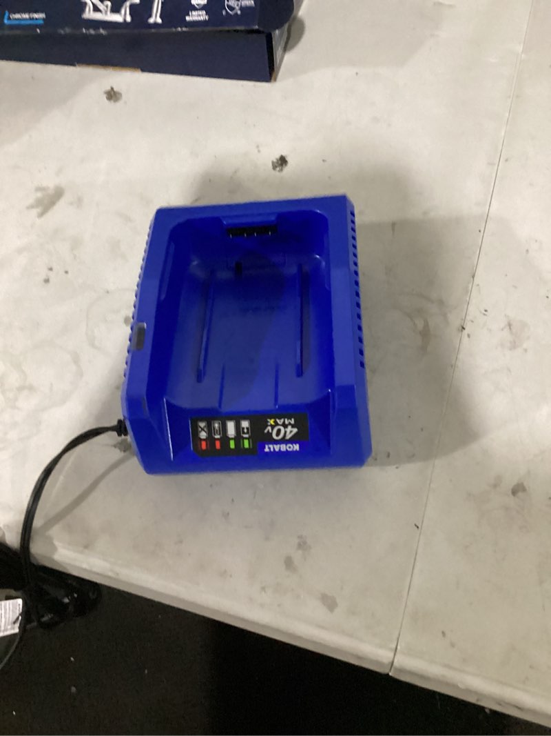 Condition photo showing As Is for kobalt 40 -volt, battery charger