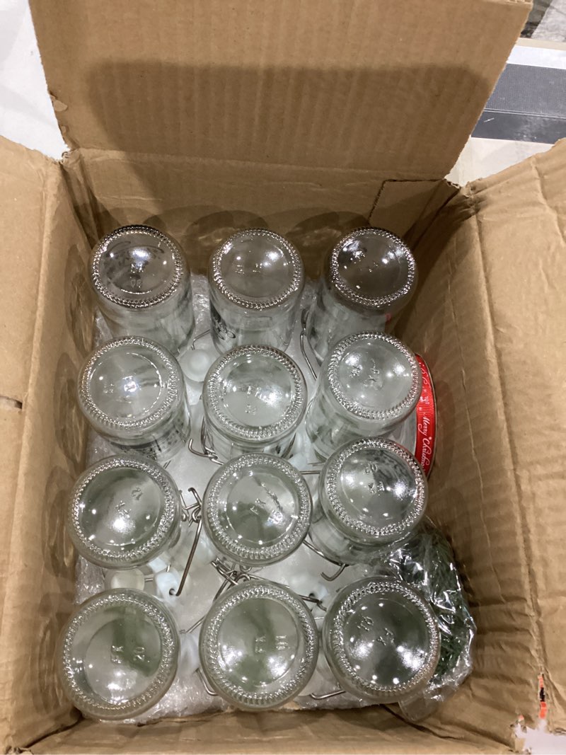 Condition photo showing As Is for Sieral 12 Pack Christmas Tree Swing Top Glass Bottle 8oz Clear Flip Top Beer Brewing Bottles with Ribbon and Artificial Branches for Liquids Wine Christmas Xmas Gifts