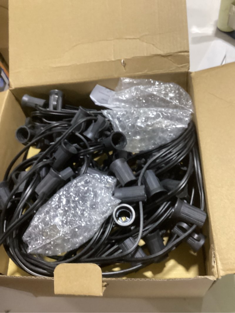 Condition photo showing Good Condition for Abeja 50FT G40 Globe String Lights, Outdoor Patio String Lights with 53 Edison Globe Bulbs(3 Spare), Hanging Bistro Light Waterproof for Balcony Party Wedding Market Cafe, Black 50FT Amber White-Black 50FT