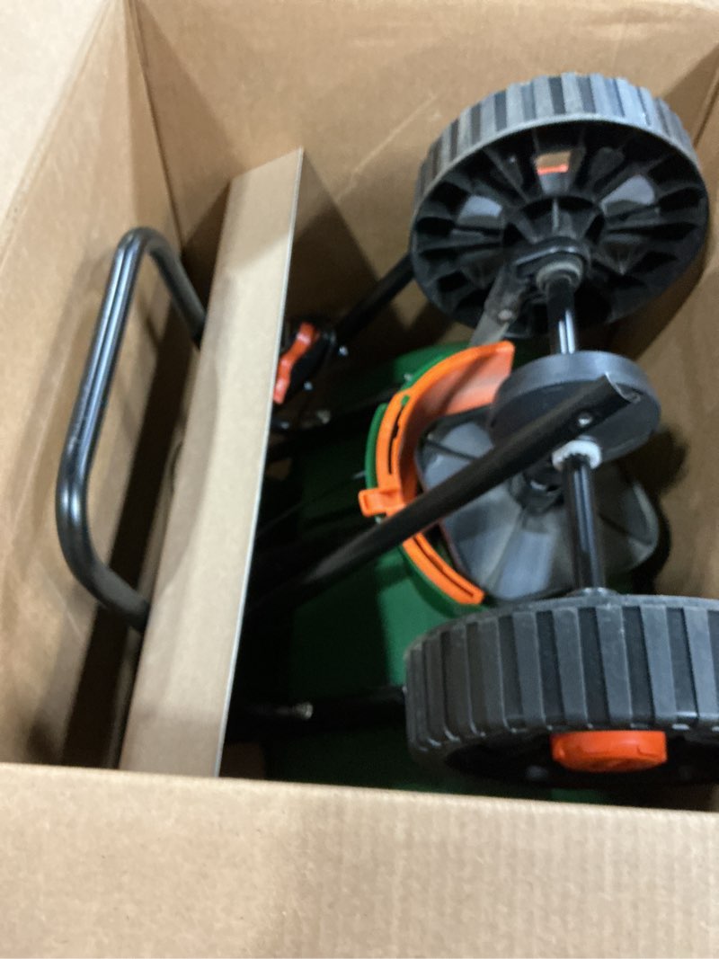 Condition photo showing Good Condition for scotts turf builder edgeguard dlx broadcast spreader - spreader for lawn fertilizer, weed & insect control, grass seed, and ice melt, holds up to 15,000 sq. ft. of product