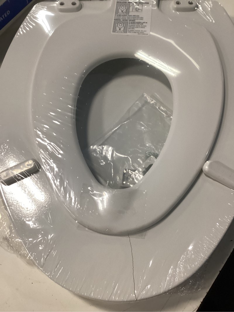 Condition photo showing As Is for mayfair by bemis nextstep2 wood white elongated soft close toilet seat