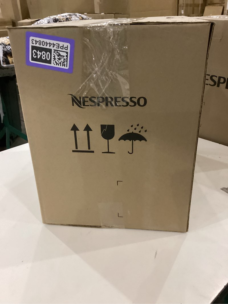 Condition photo showing New/Like New for Nespresso Vertuo Next Coffee and Espresso Maker by Breville, with Aeroccino Milk Frother, Light Grey Machine + Frother Gray