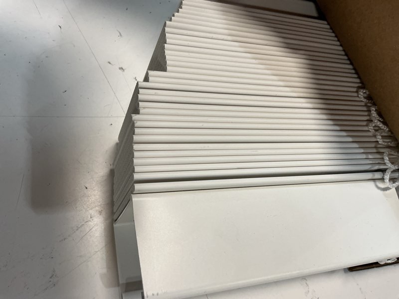 Condition photo showing As Is for levolor trim+go 2.5-in slat width 35-in x 72-in cordless white faux wood room darkening full-view standard horizontal blinds