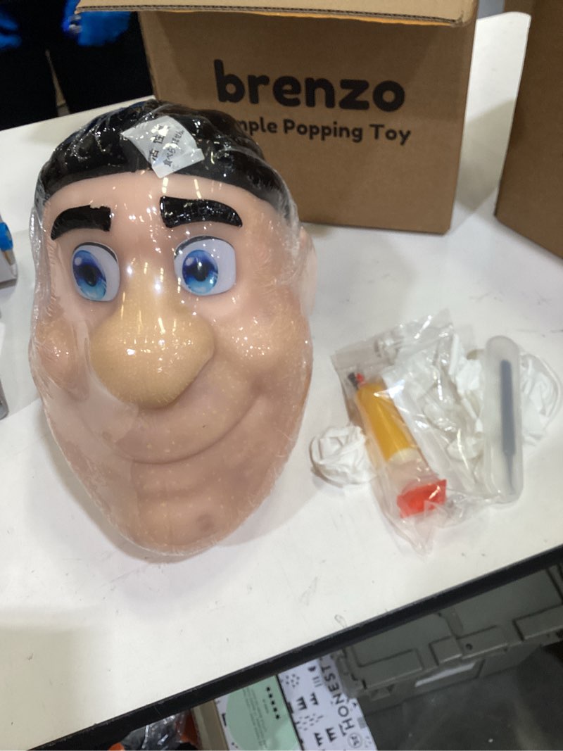 Condition photo showing Good Condition for brenzo 2026 new refillable pimple popping toy – big head squeeze toy with black hair for stress & anxiety relief, realistic pus burst fidget toy, funny gag gift for adults b-black