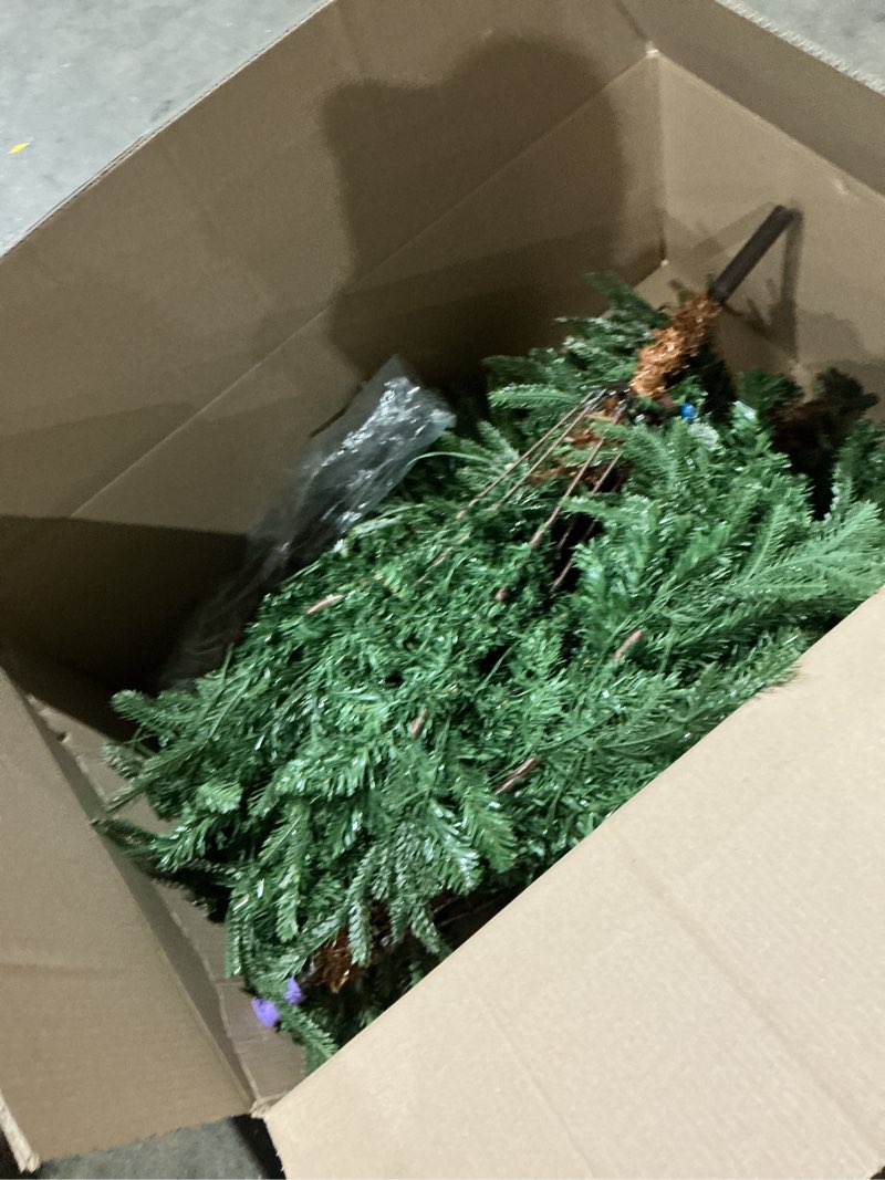 Condition photo showing As Is for goobed  prelit christmas tree