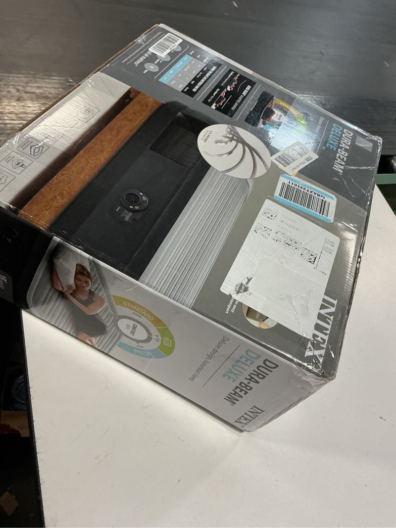 Condition photo showing New/Like New for Intex Dura-Beam Deluxe Comfort-Plush Elevated: Fiber-Tech – Queen Size – Built-in Electric Pump – 18in Bed Height – 600lb Weight Capacity 18" Grey Queen