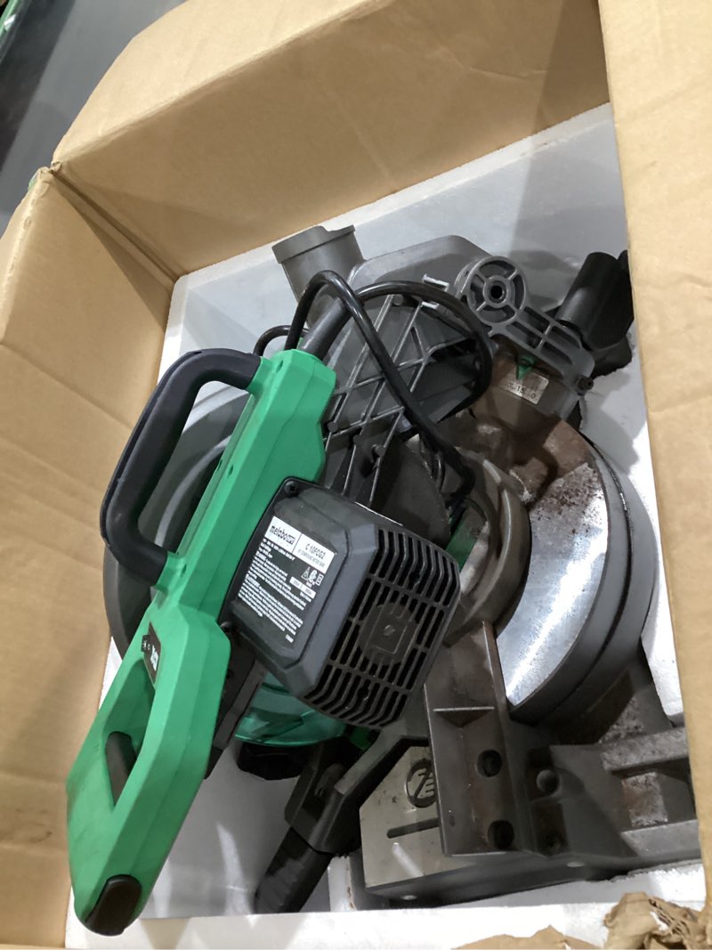 Condition photo showing As Is for metabo hpt 10-inch single bevel compound miter saw, 15-amp power saw with xact cut shadow line, single bevel 0-45°, 40t tct miter saw blade, c10fcg2